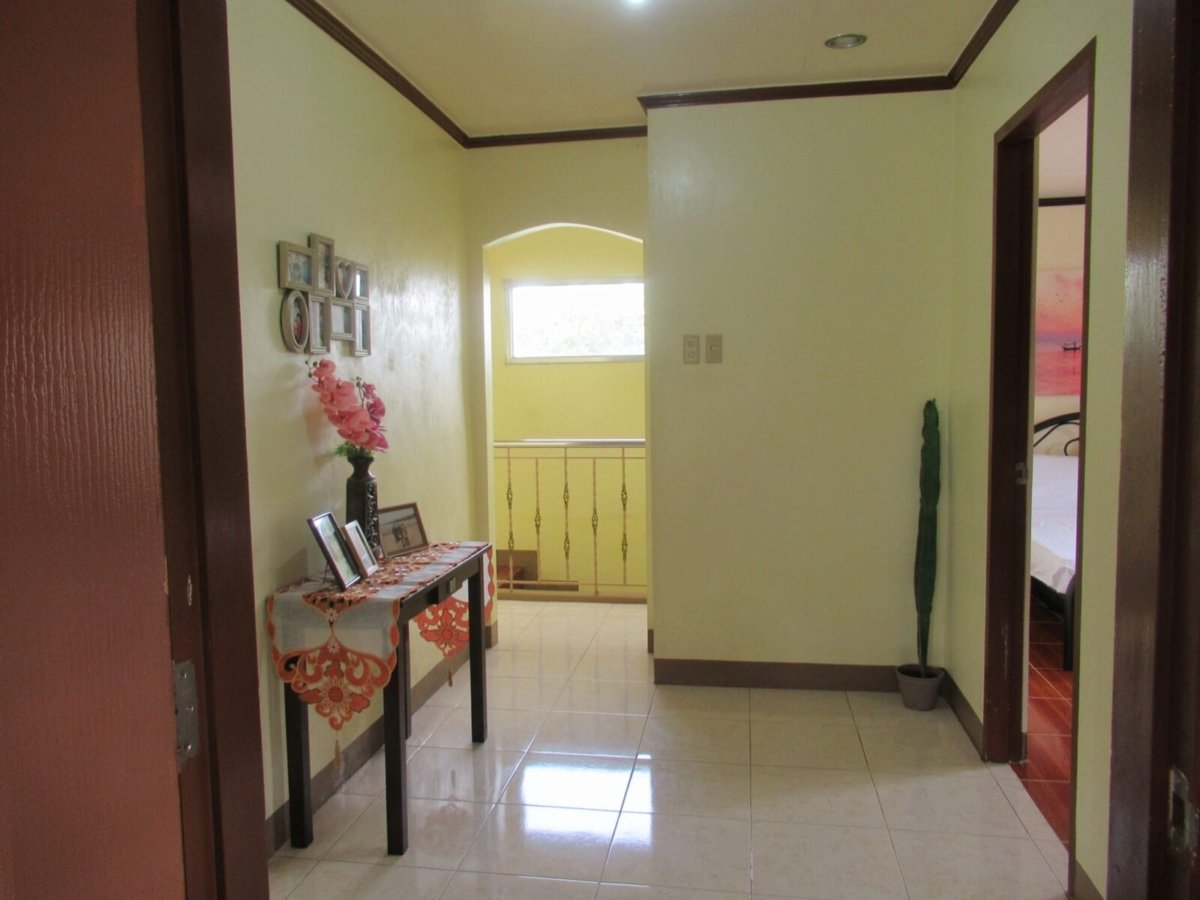 Two Storey House with Roof Deck in Victoria, Laguna
