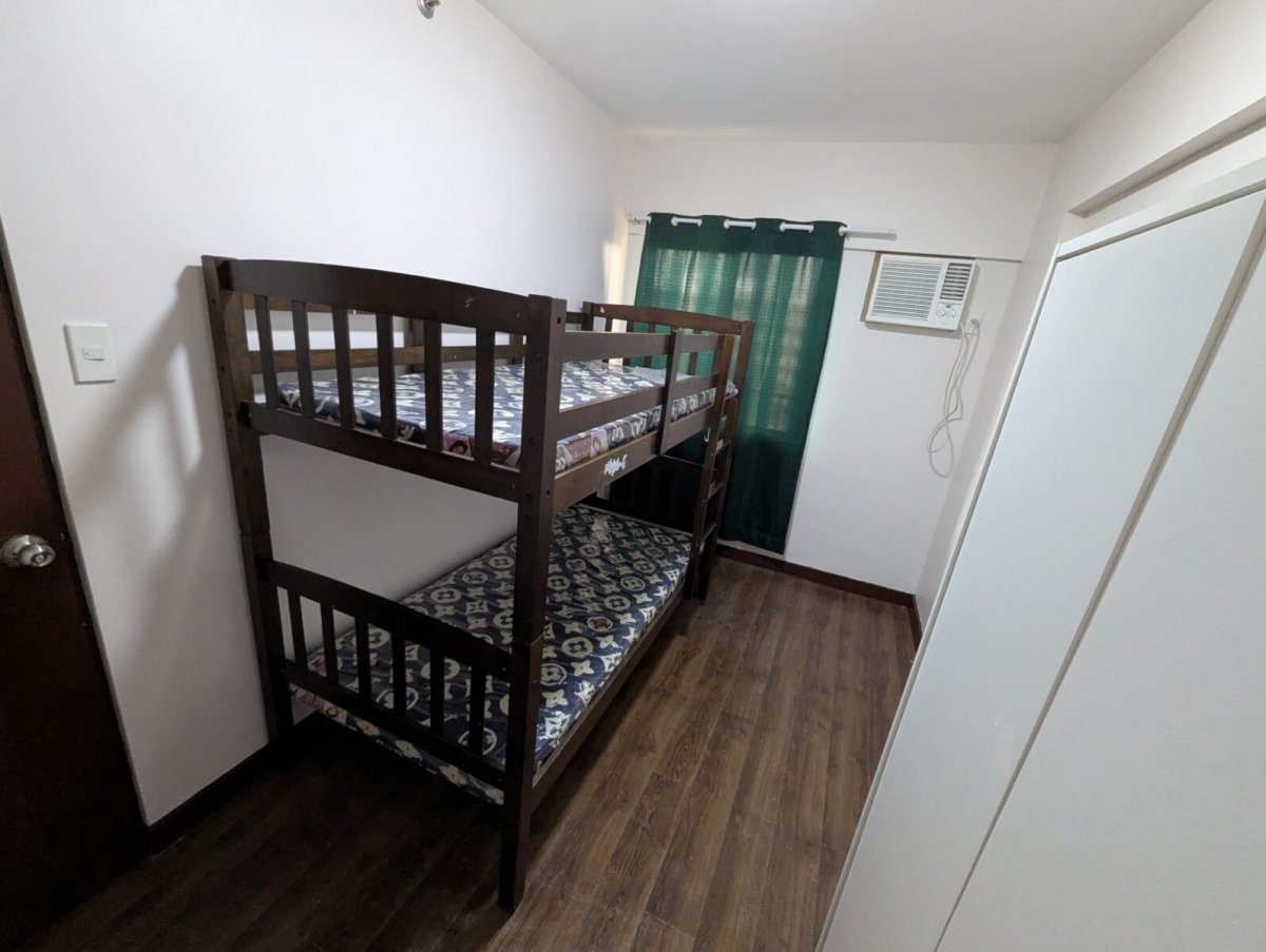 2 bedroom with balcony & laundry area 66.5sqm, Rhapsody Residences. Fully furnished (Near Festival Mall & Alabang Town Center)