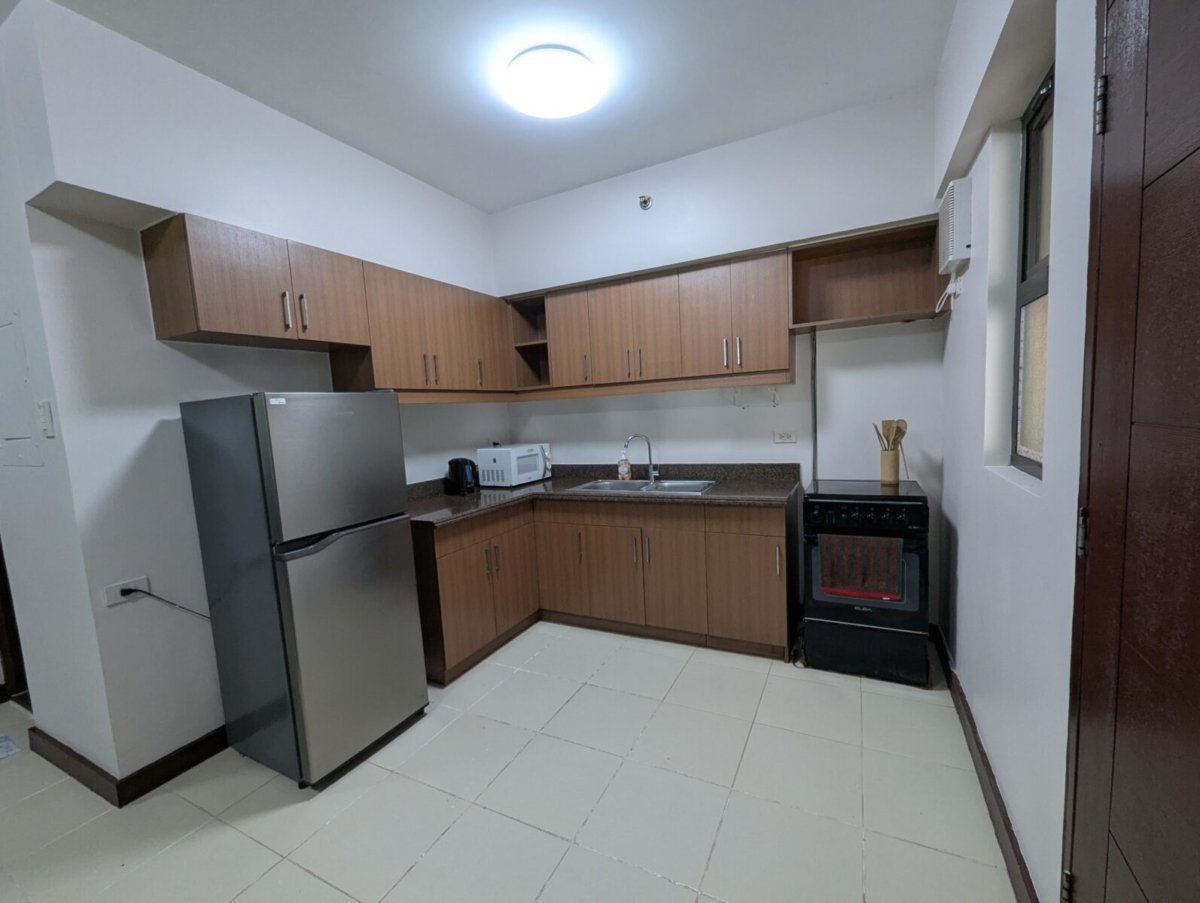2 bedroom with balcony & laundry area 66.5sqm, Rhapsody Residences. Fully furnished (Near Festival Mall & Alabang Town Center)